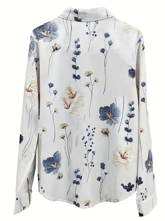 Floral patterned blouse on a white background