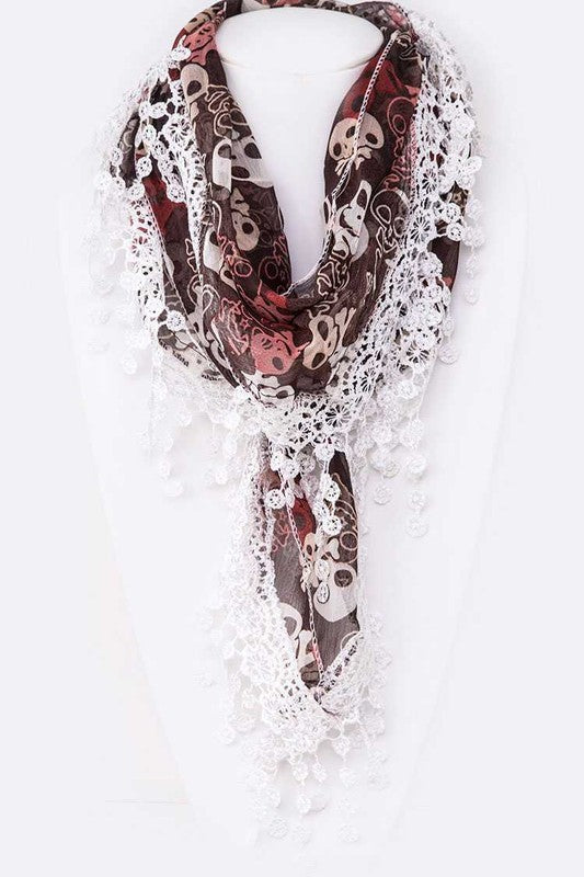 Scarf with skull and lace design on a white background
