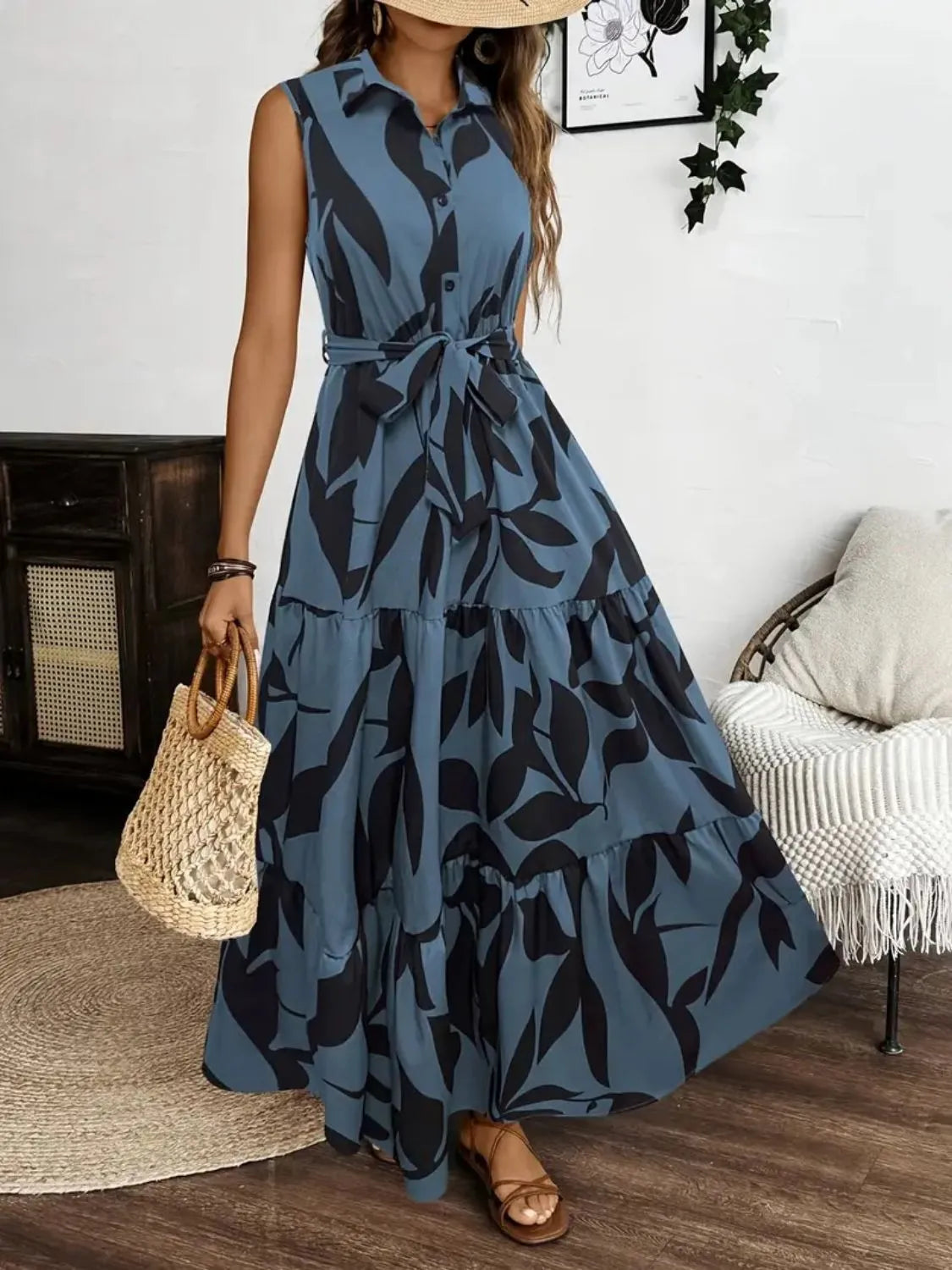 Woman wearing a blue floral dress in a home setting