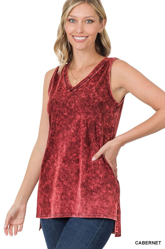 Woman wearing a red tank top with 'Cabernet' text on a white background