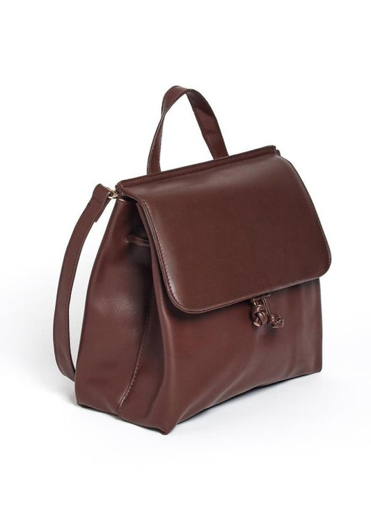 Brown leather backpack on a white background