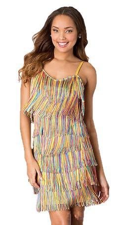 Woman wearing a colorful striped dress on a white background