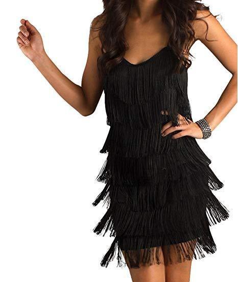 Black fringe dress worn by a model on a white background