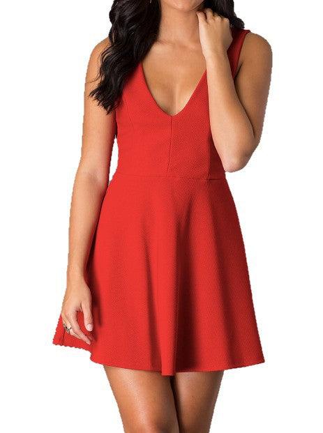 Red dress worn by a model on a white background