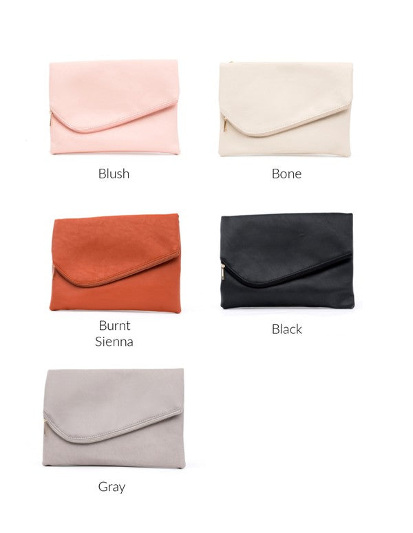 Collection of five different colored clutch bags on a white background