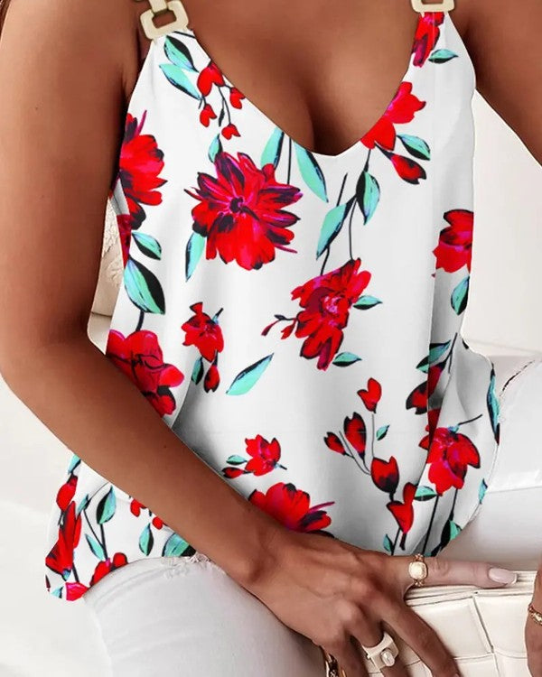 Floral print top with red flowers on a white background