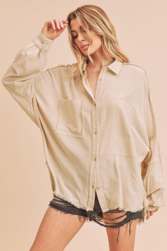 Aemi + Co Raw Edge Exposed Seam Collared Neck Long Sleeve Shirt - Leo’s Look Your Best