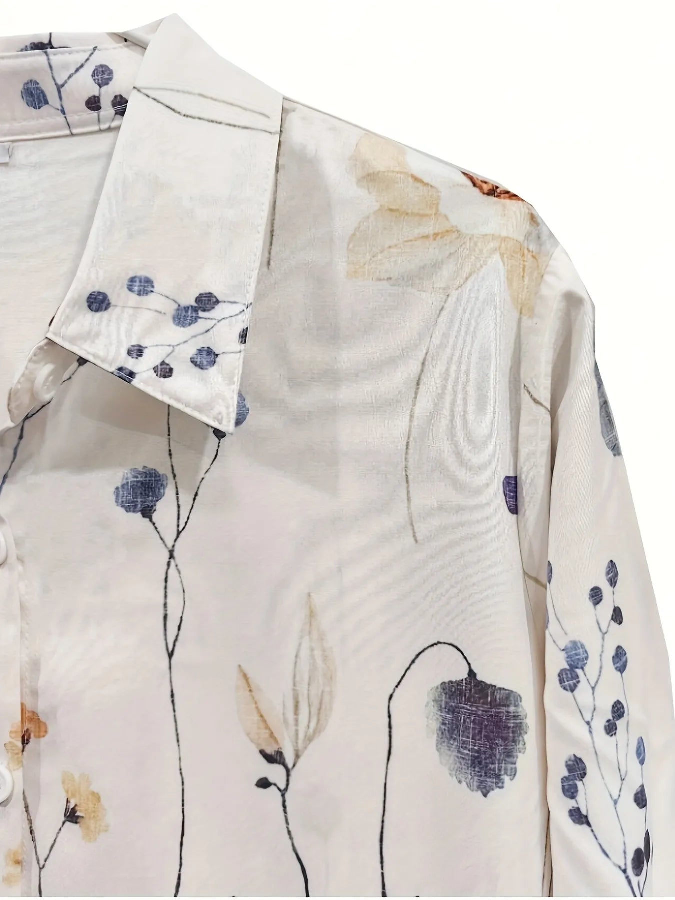 Floral patterned shirt with a collar on a white background