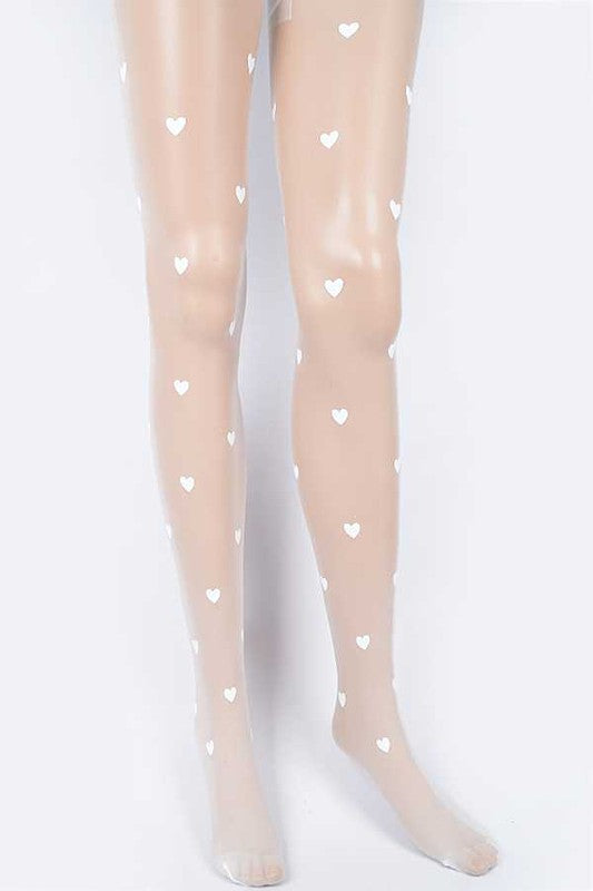 Beige tights with heart patterns on a white background