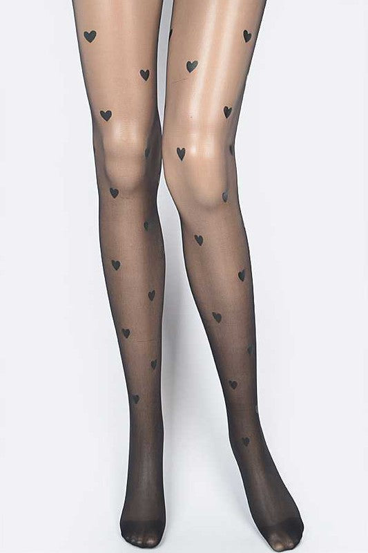 Sheer black tights with heart patterns on a white background