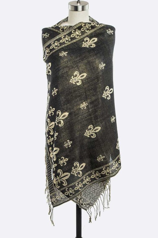 Black scarf with gold embroidery on a mannequin against a white background