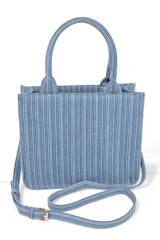 Blue striped tote bag with a strap on a white background