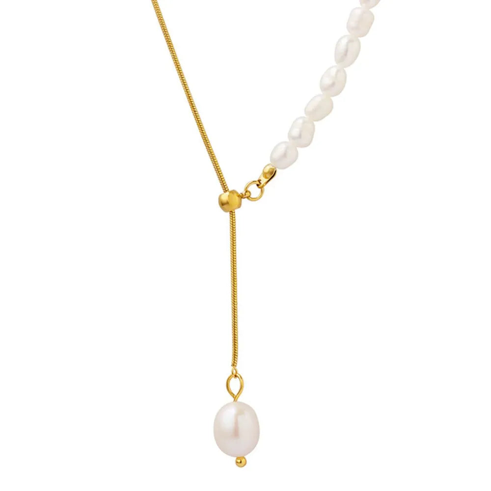 a gold and pearl necklace