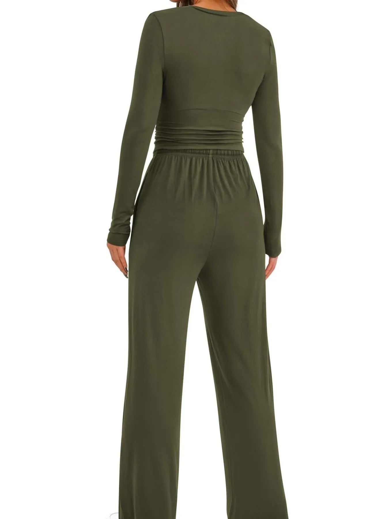 Green jumpsuit on a white background
