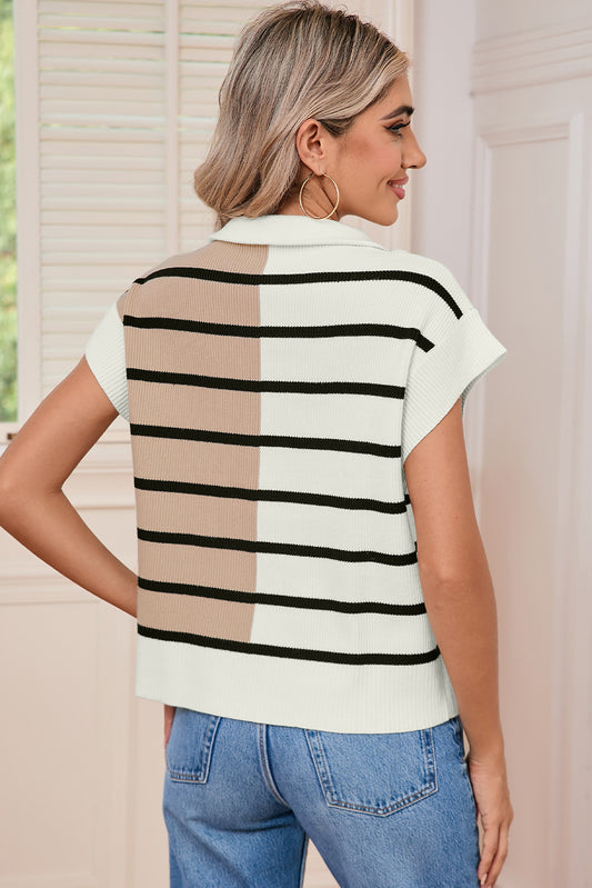 Woman wearing a striped shirt with a neutral color palette.