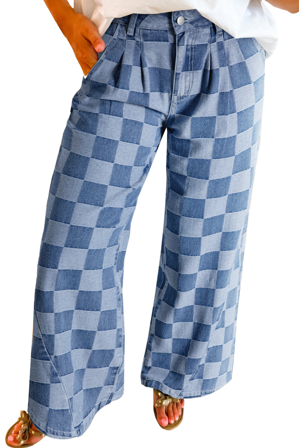 Blue checkered pants worn by a person on a white background