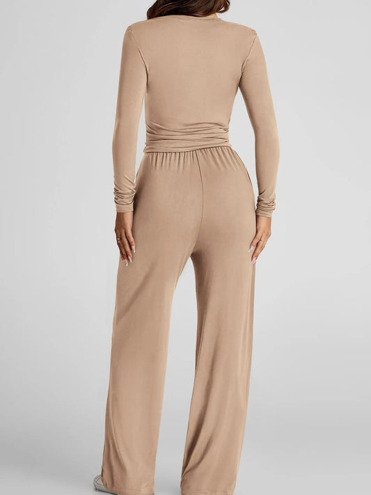 Beige jumpsuit on a plain background