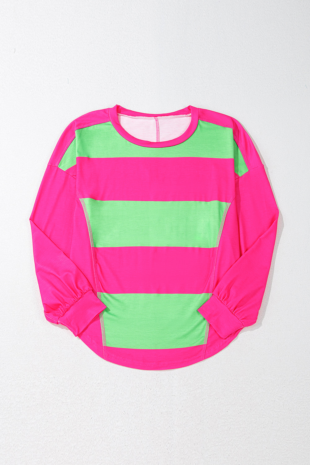 Neon pink and green striped long-sleeve shirt on a white background