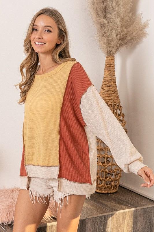 BiBi Waffle-Knit Exposed Seam Color Block Uneven Hem Top - Leo’s Look Your Best