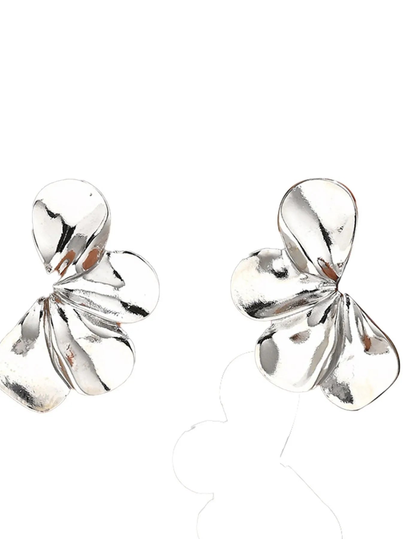 Silver earrings on a white background
