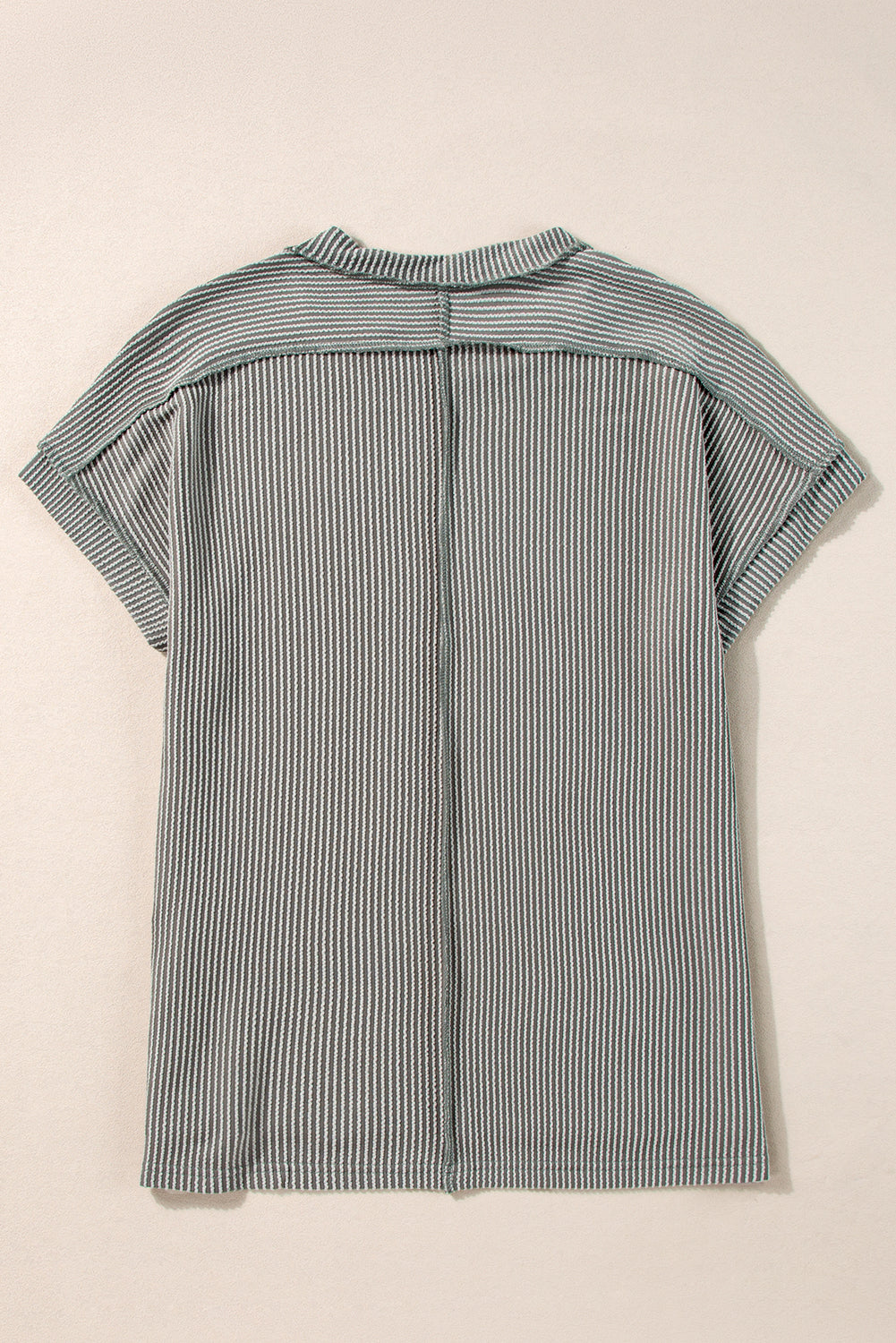 Striped shirt on a beige background