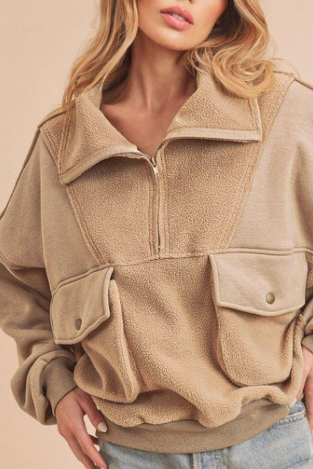 Aemi + Co Exposed Seam Half Zip Sweatshirt with Pockets - Leo’s Look Your Best
