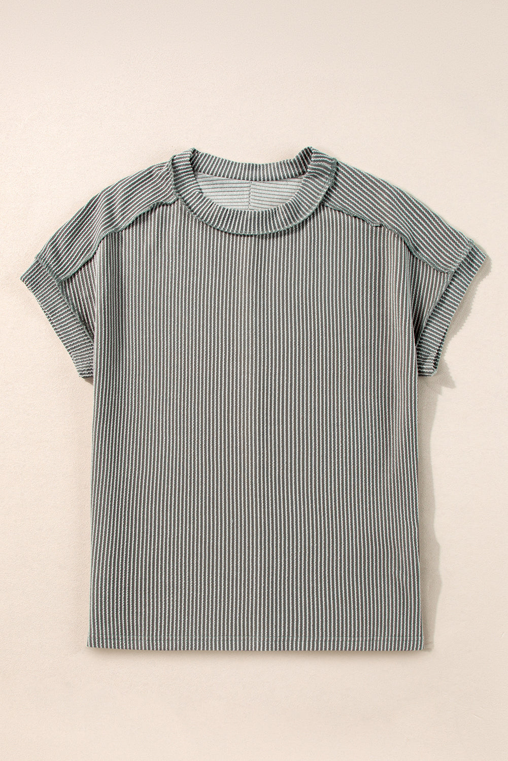 Striped shirt on a beige background