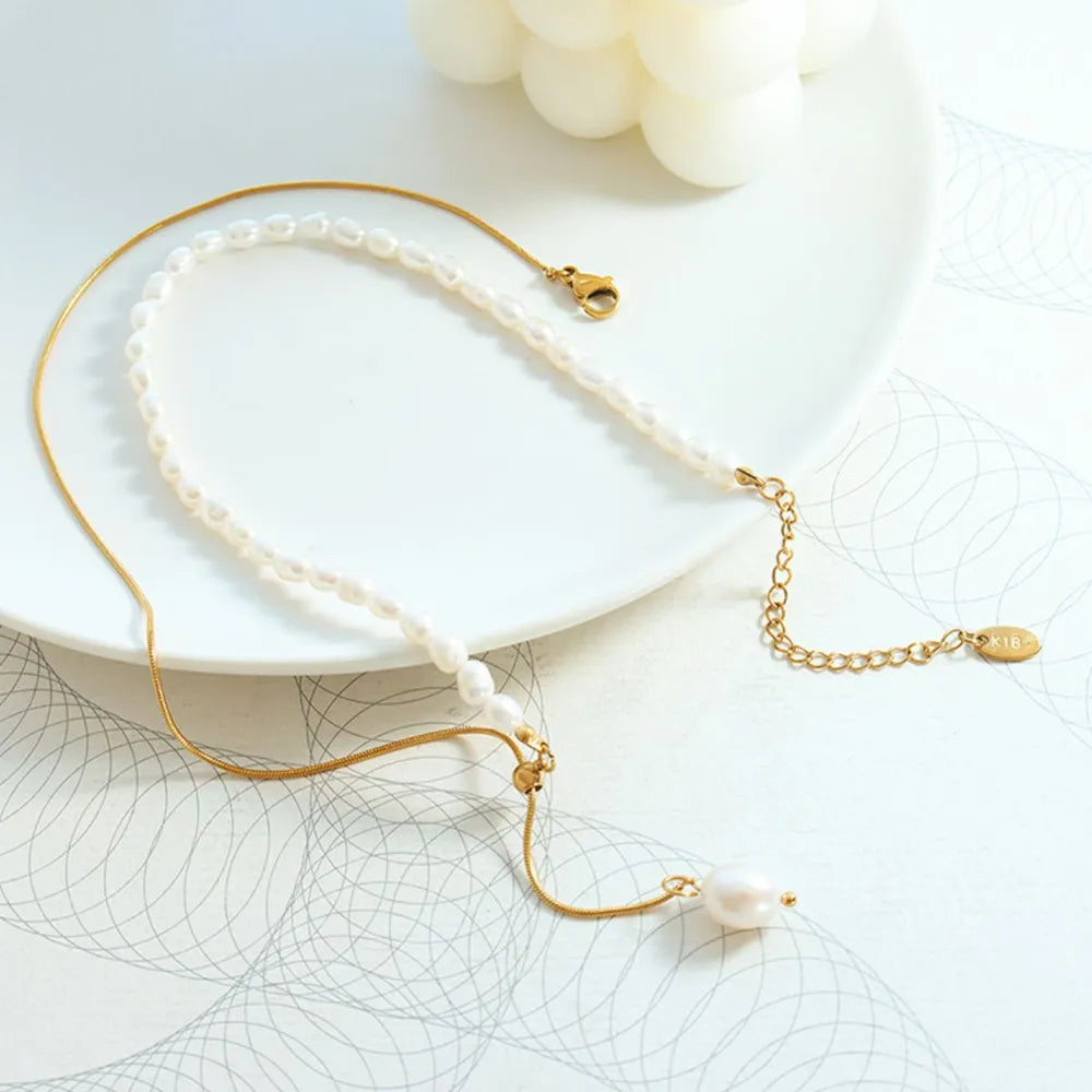 a gold and pearl necklace