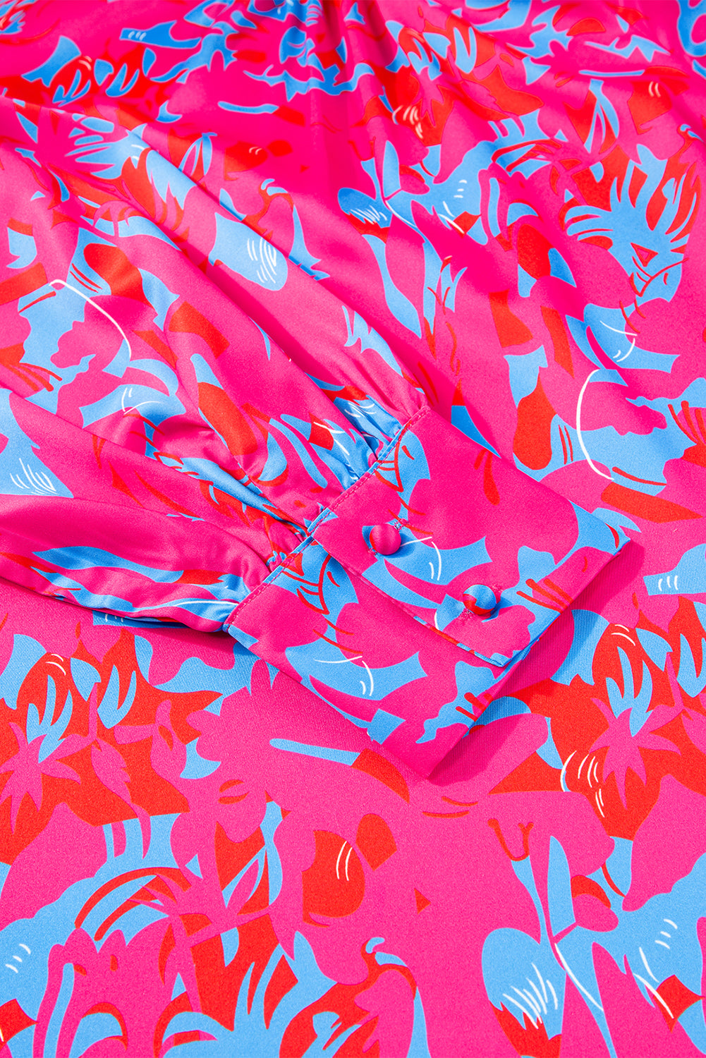 Colorful fabric with pink and blue abstract pattern