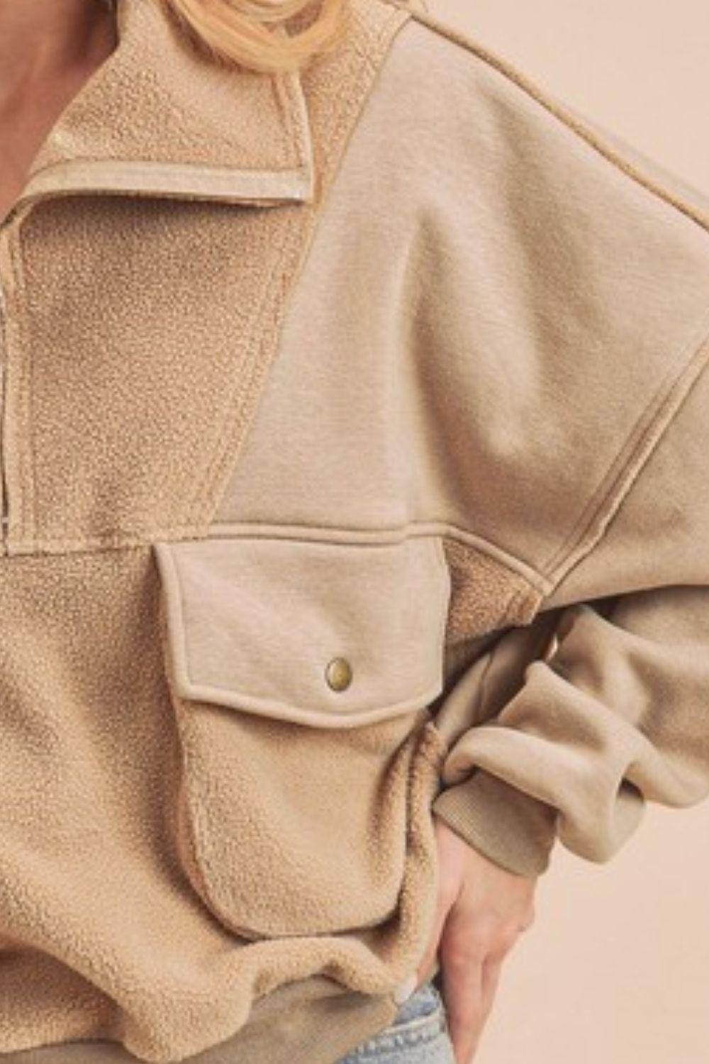 Aemi + Co Exposed Seam Half Zip Sweatshirt with Pockets - Leo’s Look Your Best