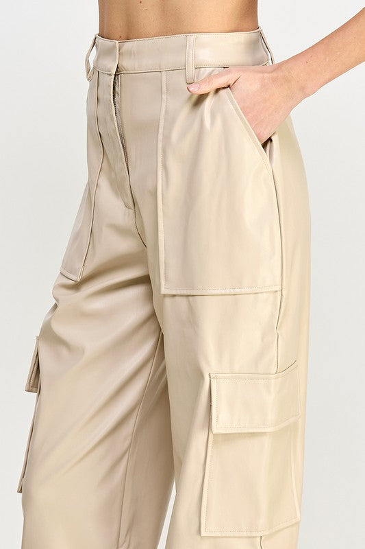 Beige cargo pants worn by a person on a white background