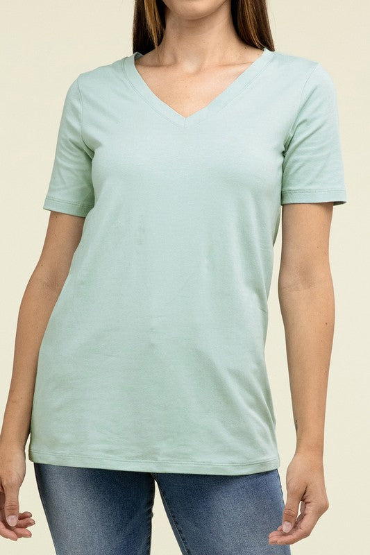 Light blue t-shirt worn by a person on a beige background