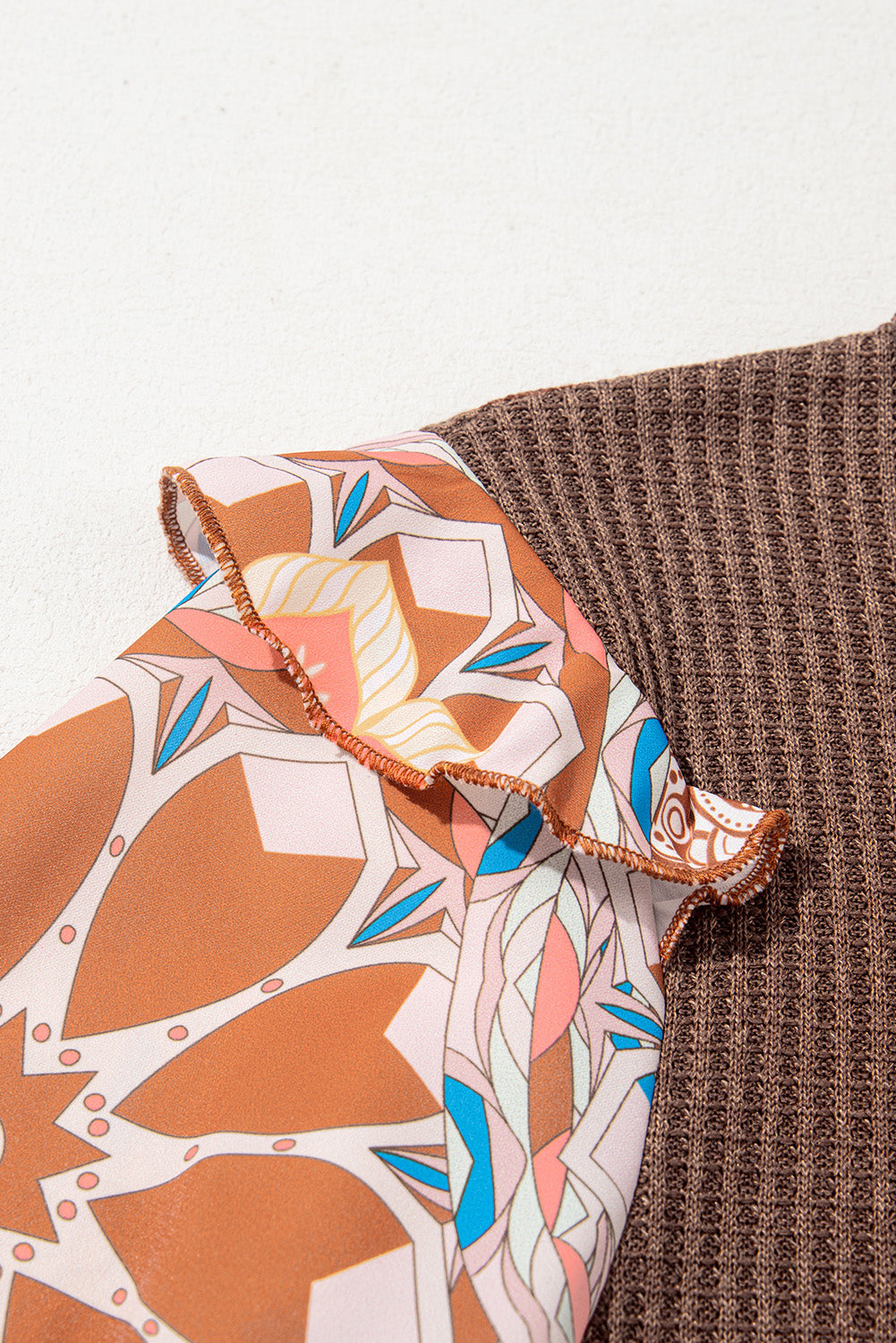 Close-up of a fabric with geometric pattern on a textured surface