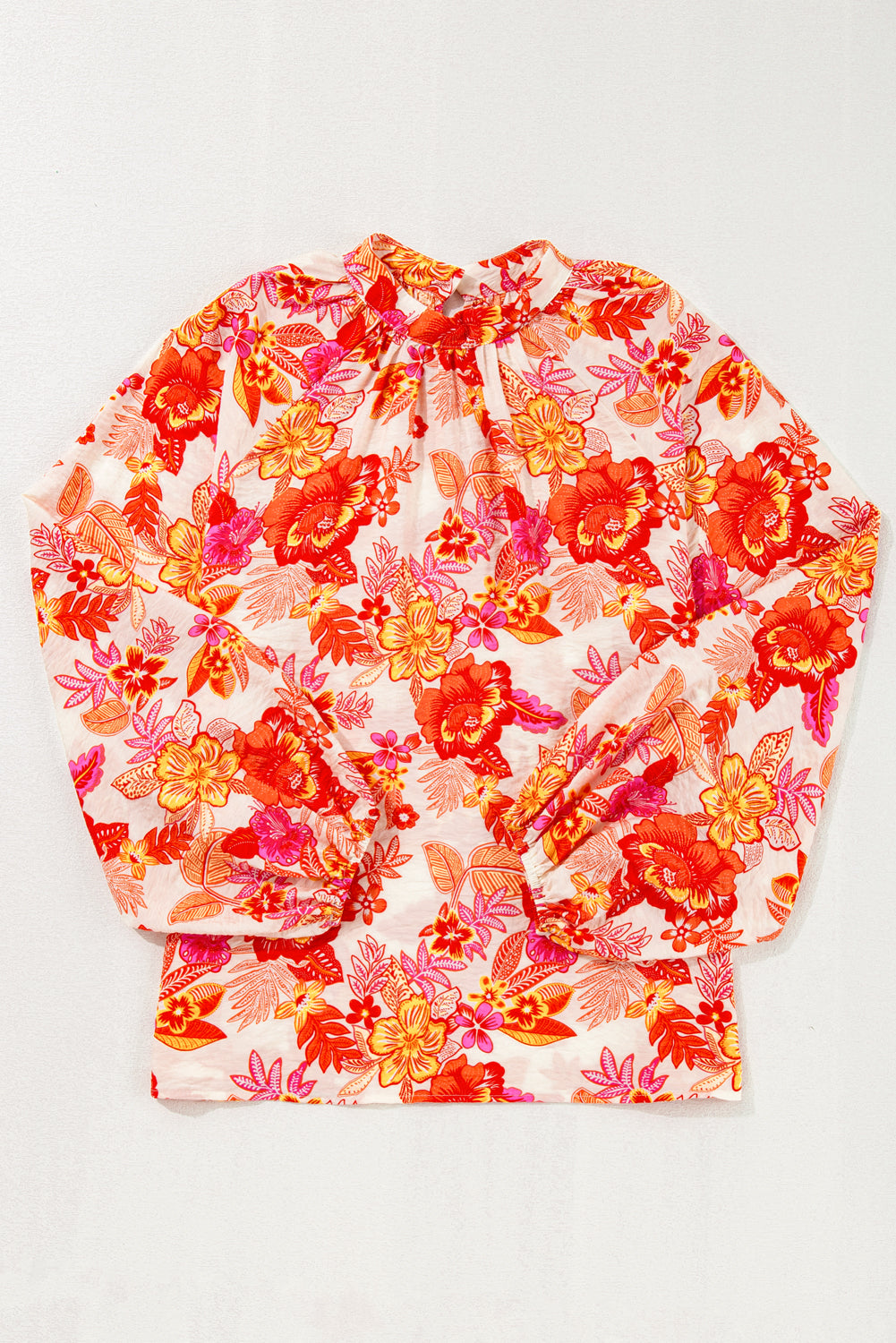 Floral patterned headscarf on a white background