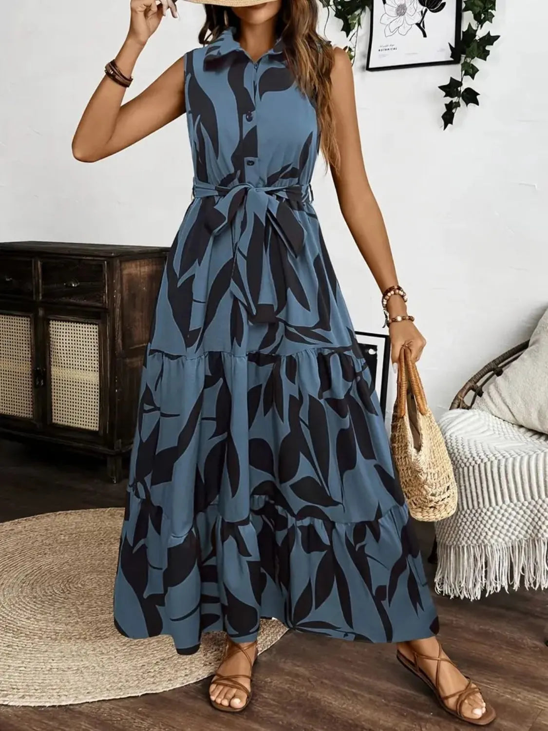 Woman wearing a blue patterned dress in a home setting
