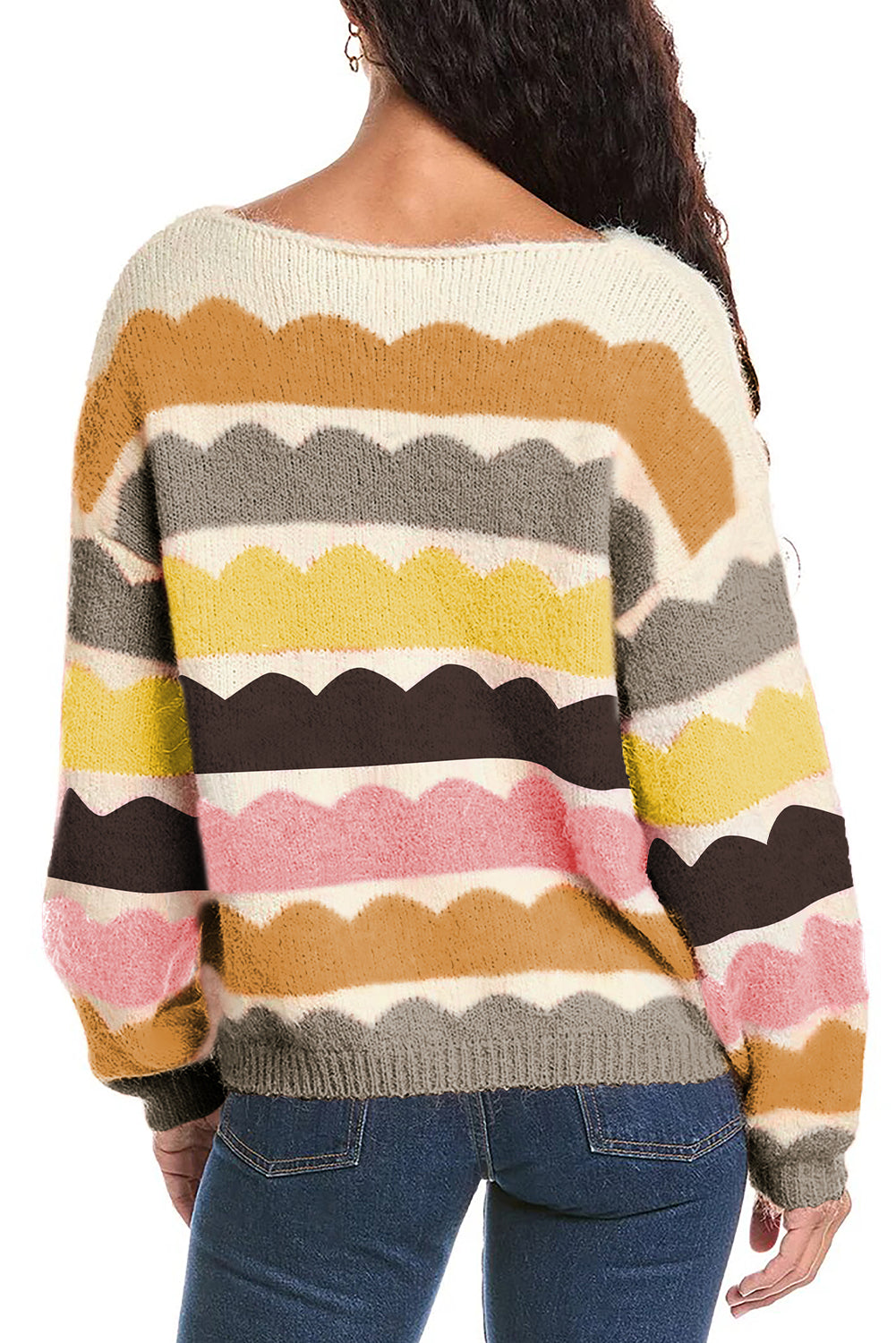 Multicolored striped sweater worn by a person on a white background