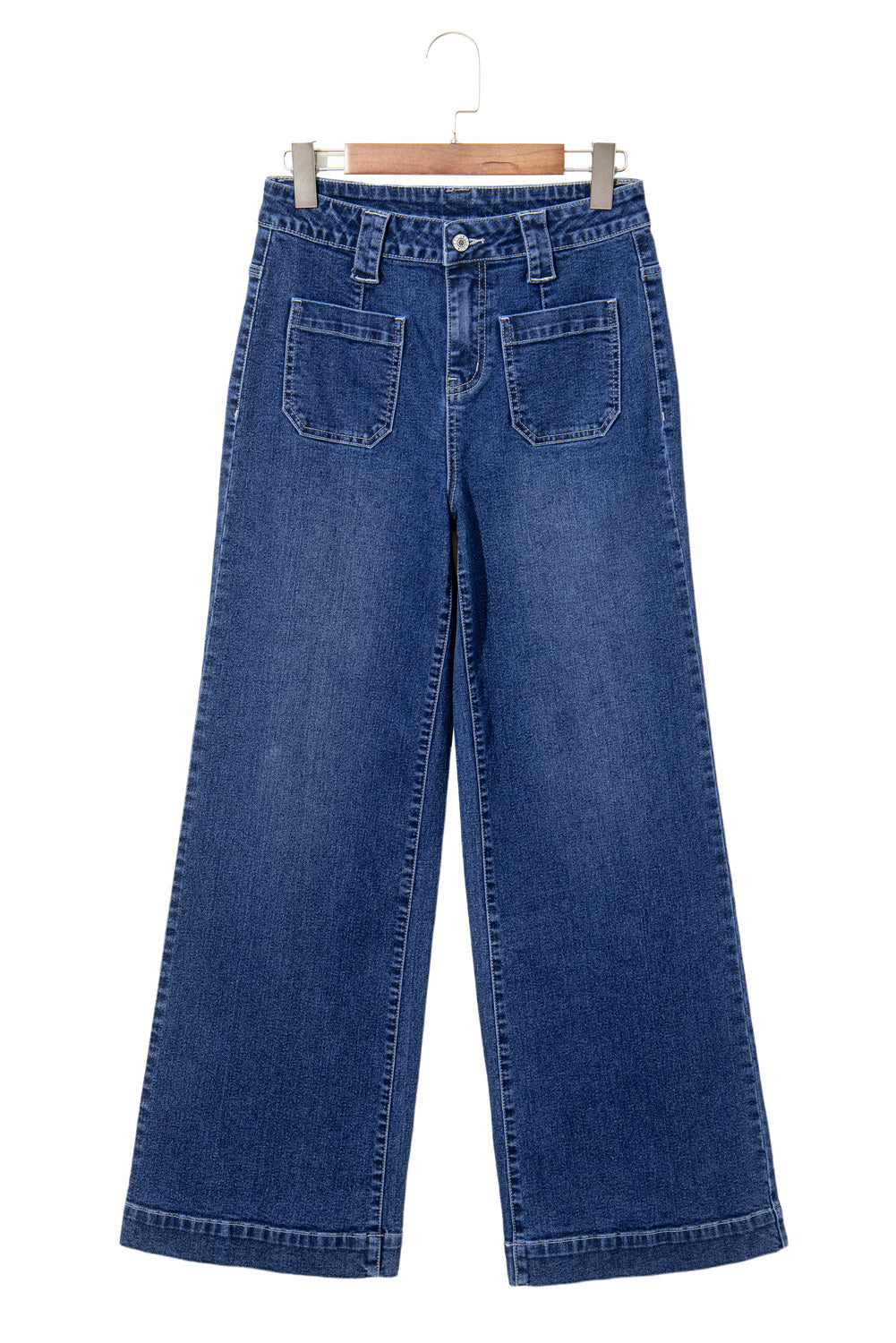 Blue jeans on a hanger against a white background