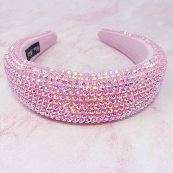 Pink blinged-out headband on a pink background