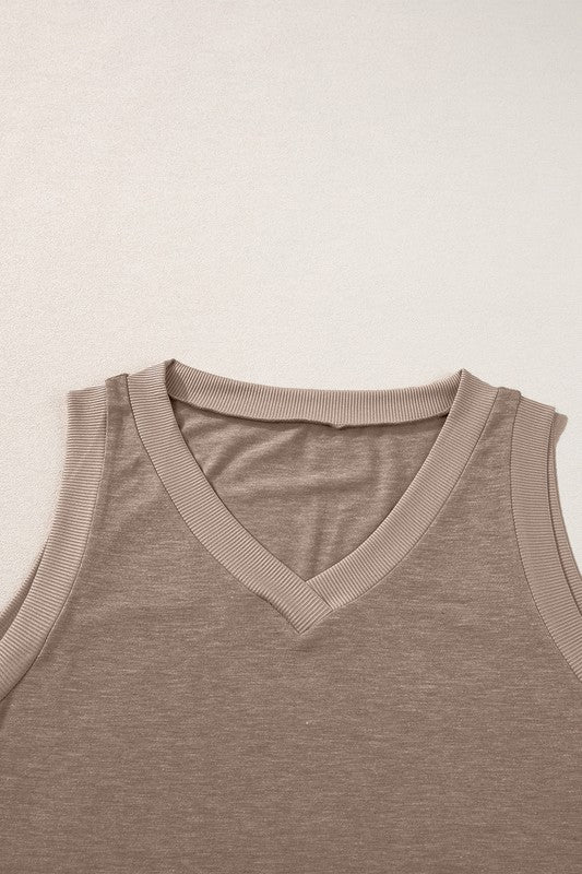Brown sleeveless shirt on a light beige background