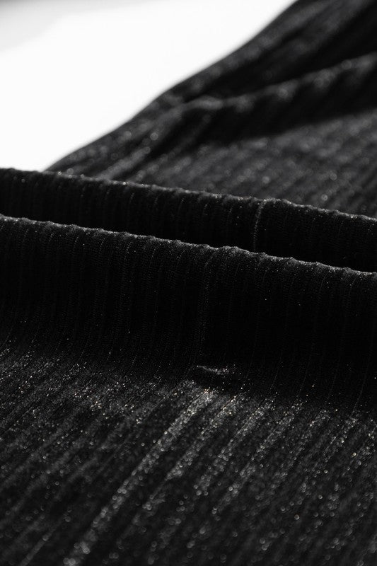 Close-up of black corduroy fabric texture