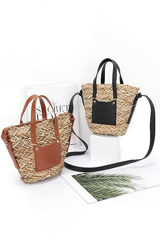 Two woven handbags with leather accents on a white background