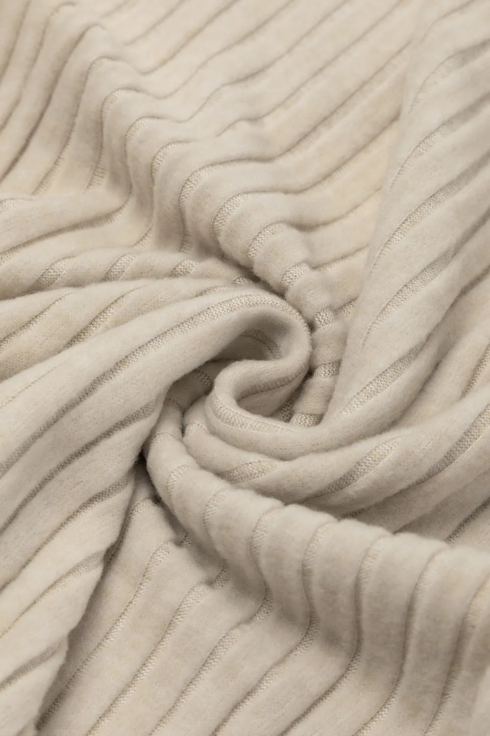 Close-up of beige textured fabric