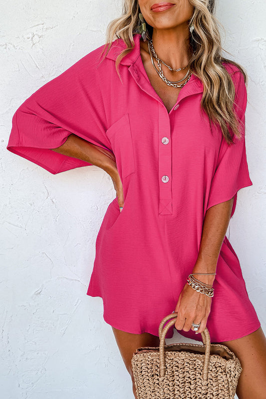 Woman wearing a pink dress against a white background