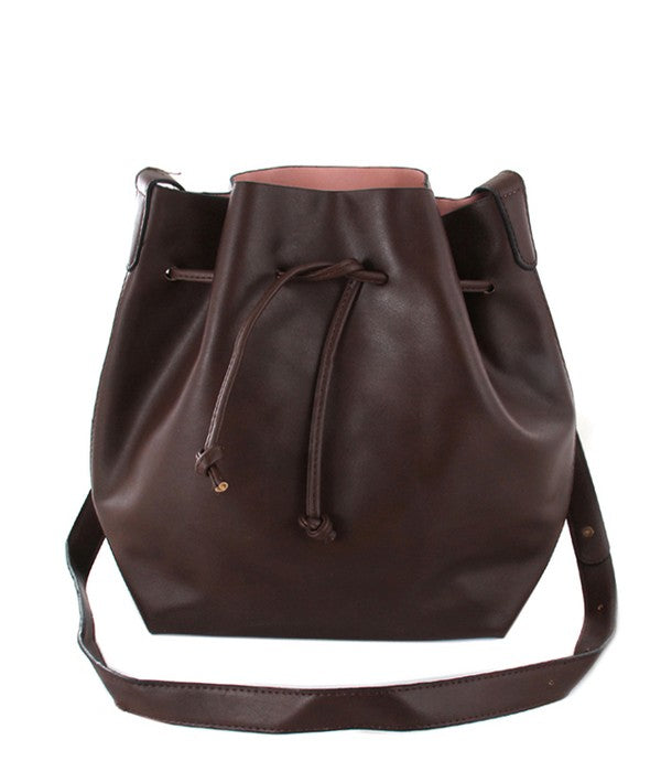 Brown leather bucket bag with a drawstring on a white background