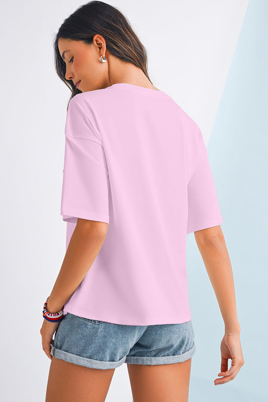 Woman wearing a light pink t-shirt and denim shorts on a gradient background