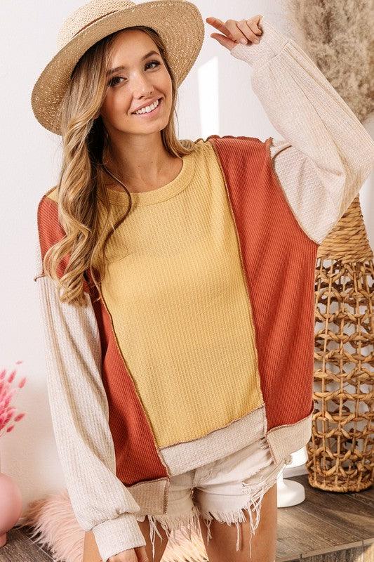 BiBi Waffle-Knit Exposed Seam Color Block Uneven Hem Top - Leo’s Look Your Best